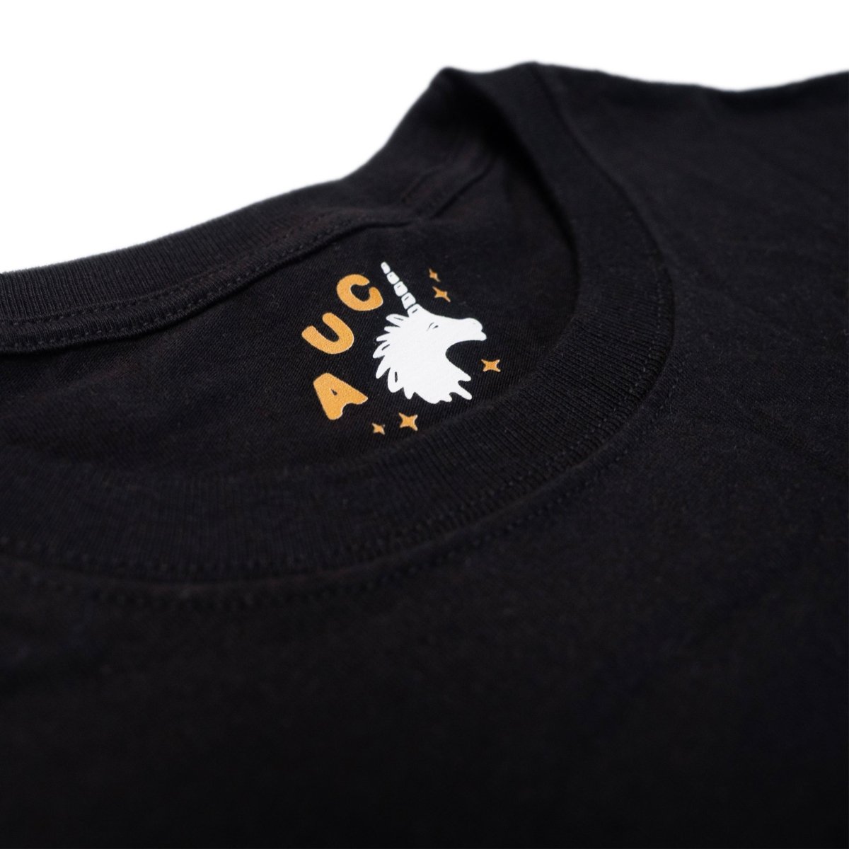 Shake Them Haters Off - Heavyweight Black Tee - Image of neck label print up close - Austin Unicorn Club Apparel