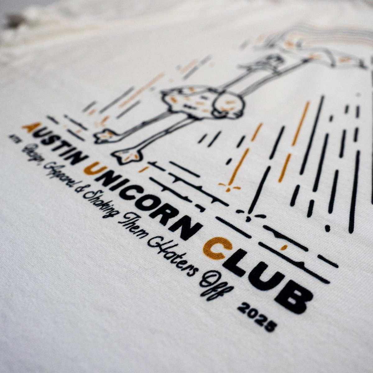 Shake Them Haters Off - Heavyweight White Tee - Image of back print up close - Austin Unicorn Club Apparel